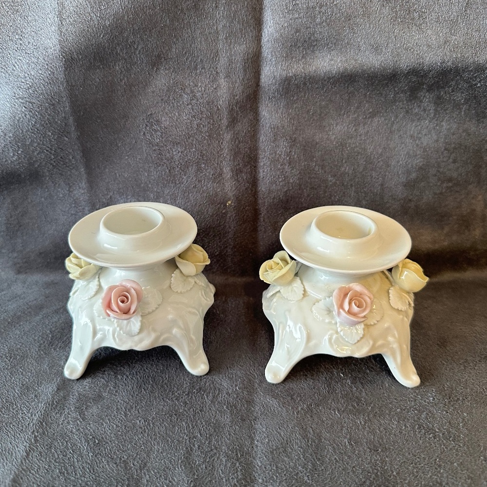A pair of porcelain candle stick holders, AK, Kaiser, west Germany